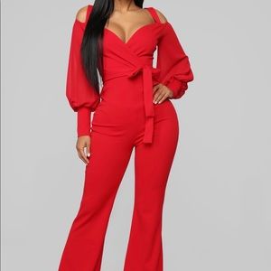 Red full length Fashion Nova jumpsuit.